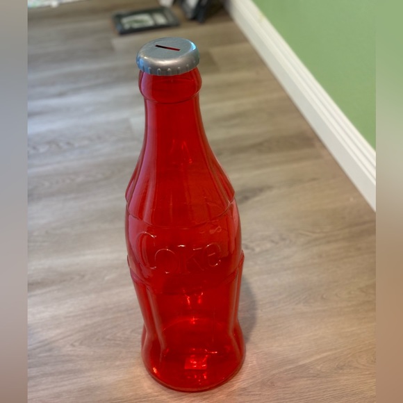 Coca cola bottle (can be used to put money in it)  CHECK PROFILE BIO - Picture 5 of 5
